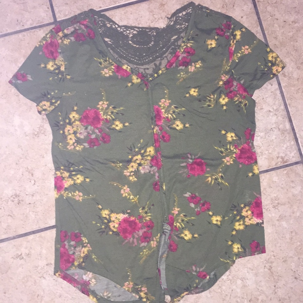 Green shirt with red and yellow flowers